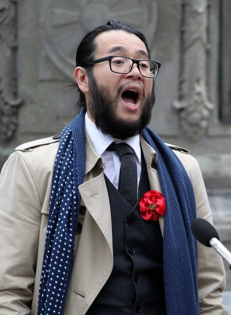 Mr.  Kevin Takahide Lee singing "God Save the Queen"; Photo by ©︎Toru Furukawa/ The Vancouver Shinpo