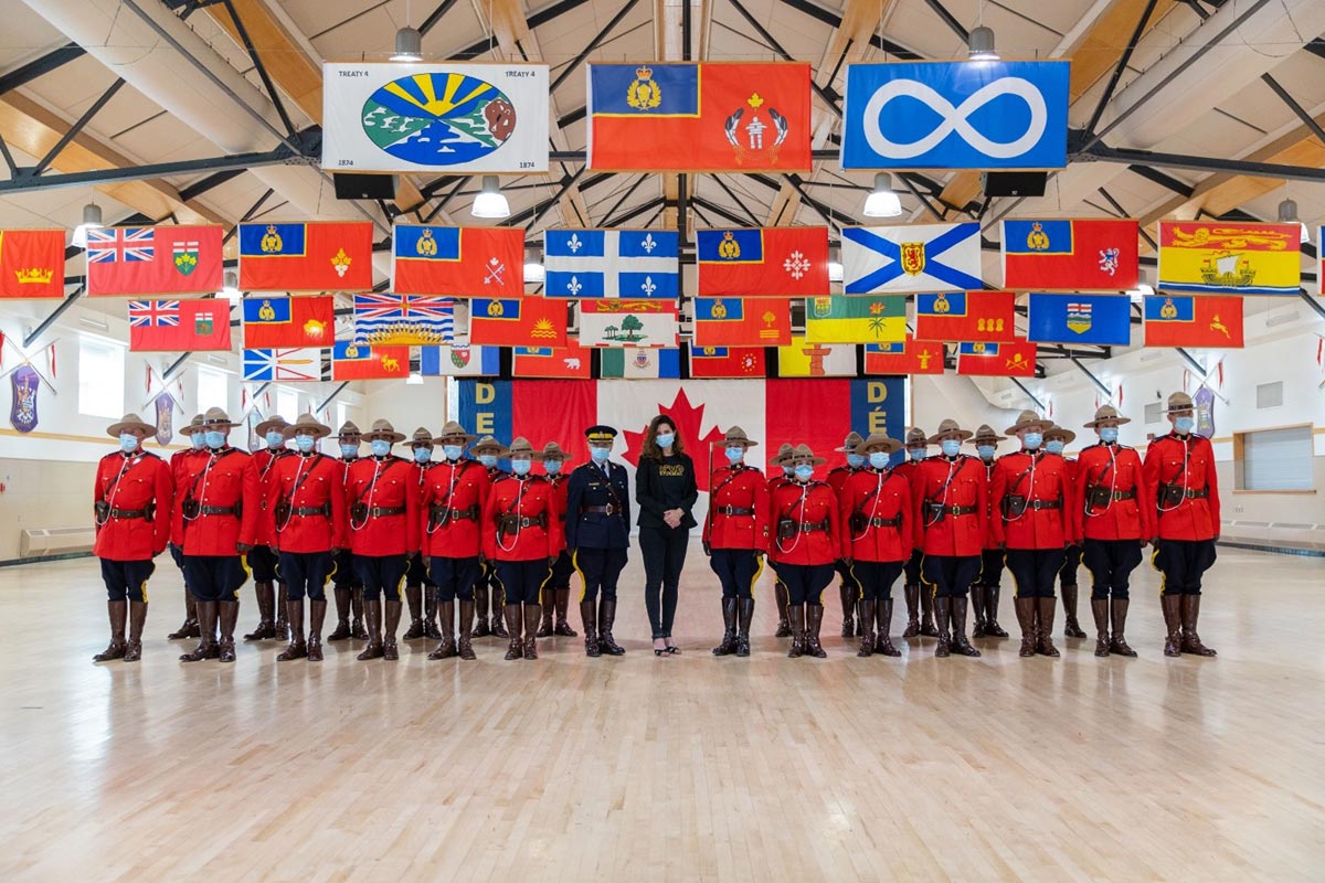 Mayor Masters (center) with Chief Superintendent Sylvie Bourassa-Muise and RCMP Depot Cadets Troop 11. Photo provided by the City of Regina