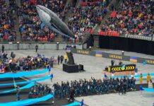 2025年インビクタス・ゲーム、バンクーバーで開幕 空中に浮かぶクジラの下を選手入場。Photo from Invictus Game 2025 website