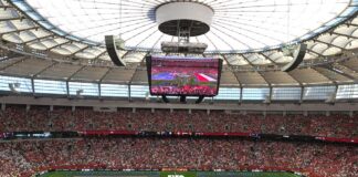 W杯グループG、エジプトが首位に躍り出る 試合開始前、両国の旗がピッチを覆う。2026年6月21日、バンクーバー市。撮影 三島直美/日加トゥデイ